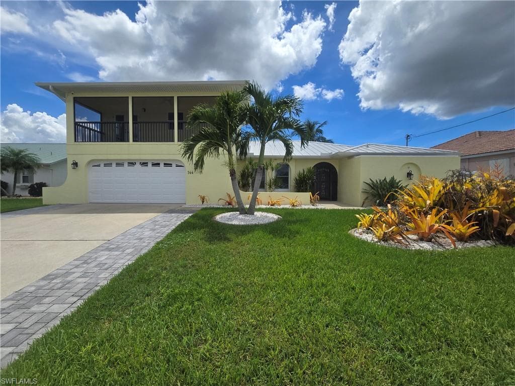 144 SW 38th TER CAPE CORAL, FL 33914