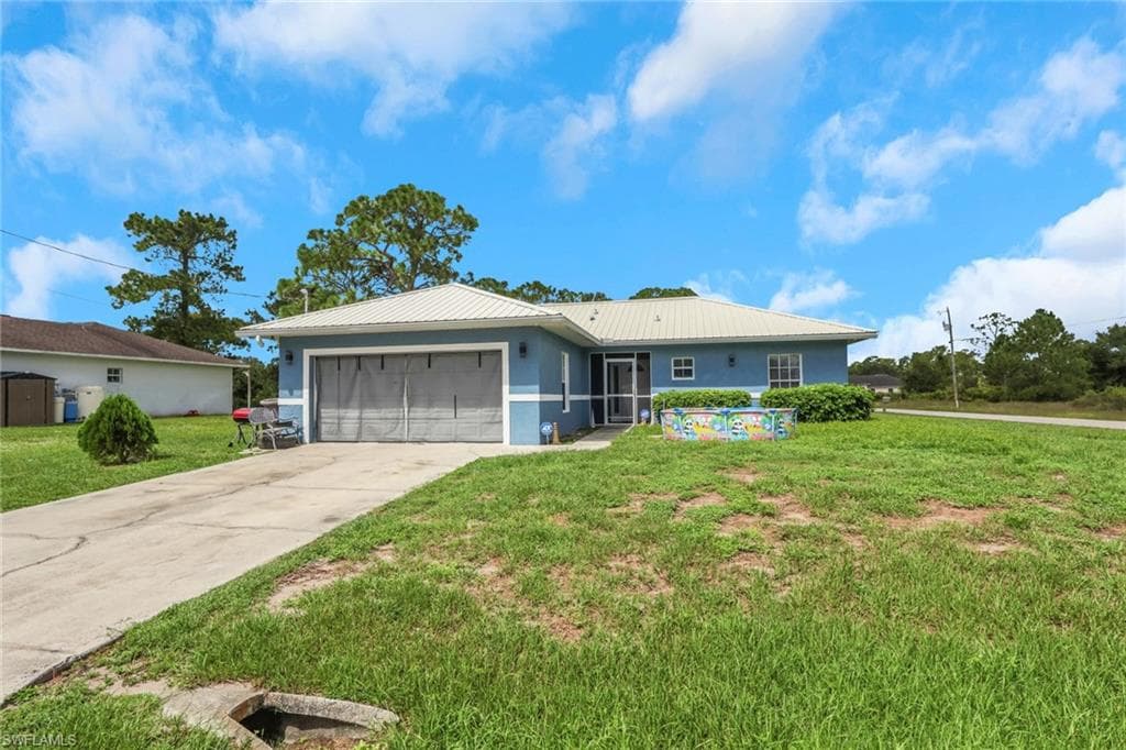 912 Mary AVE S LEHIGH ACRES, FL 33974