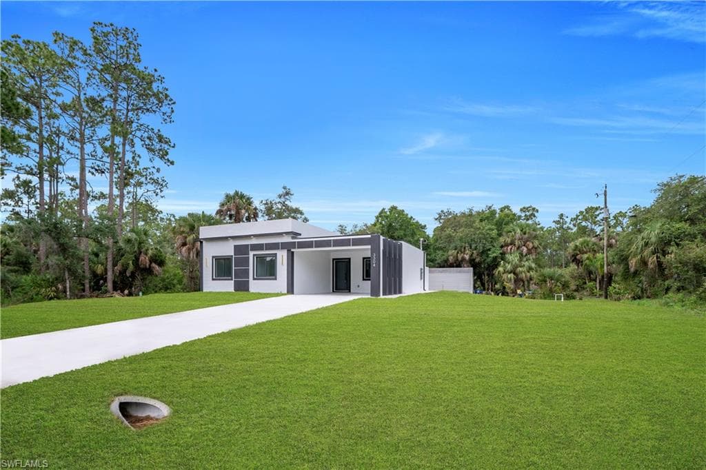 3304 E 15th ST LEHIGH ACRES, FL 33972