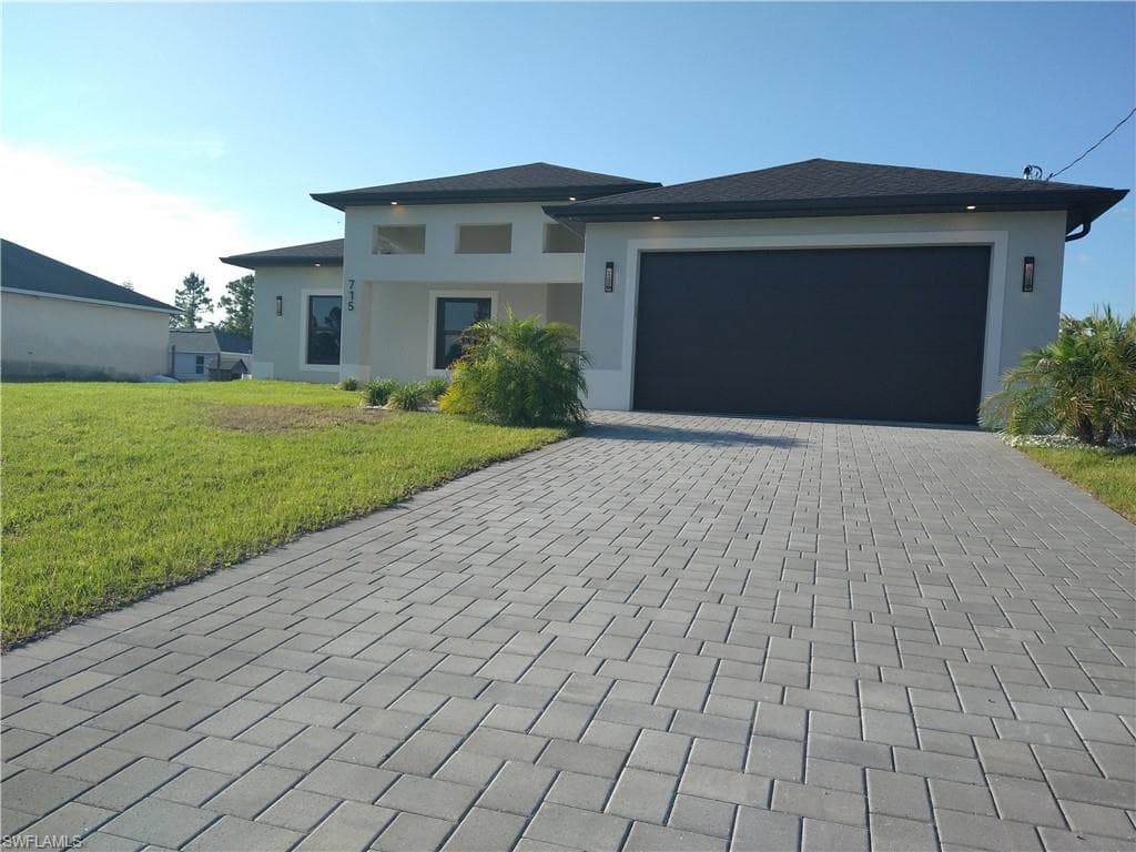 712 THEODORE VAIL ST E LEHIGH ACRES, FL 33974