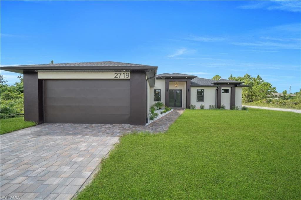 2719 33RD ST W LEHIGH ACRES, FL 33971