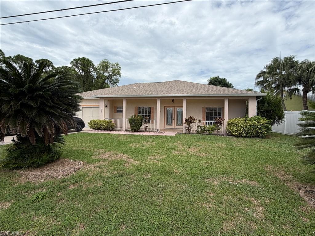 721 Milwaukee BLVD LEHIGH ACRES, FL 33974