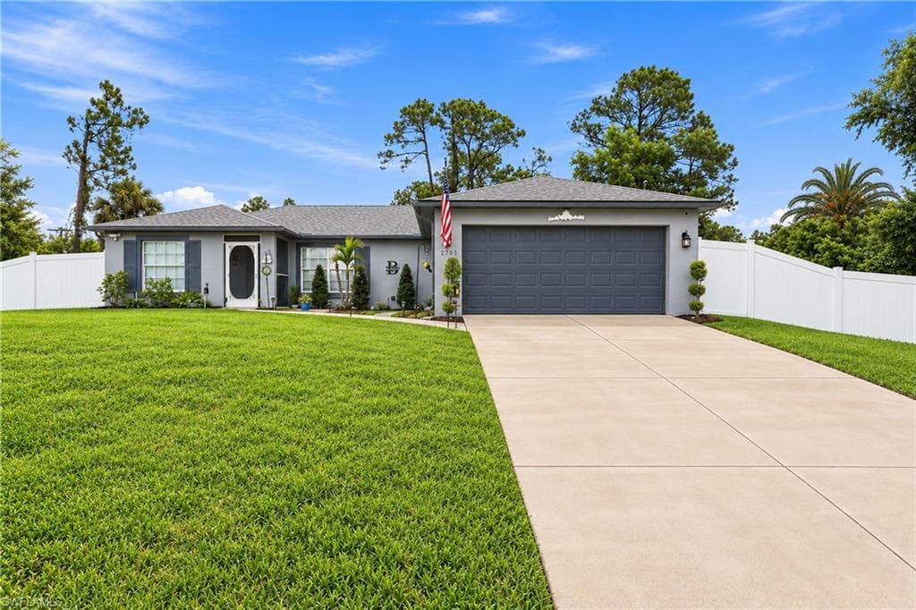 2703 E 8th ST LEHIGH ACRES, FL 33936