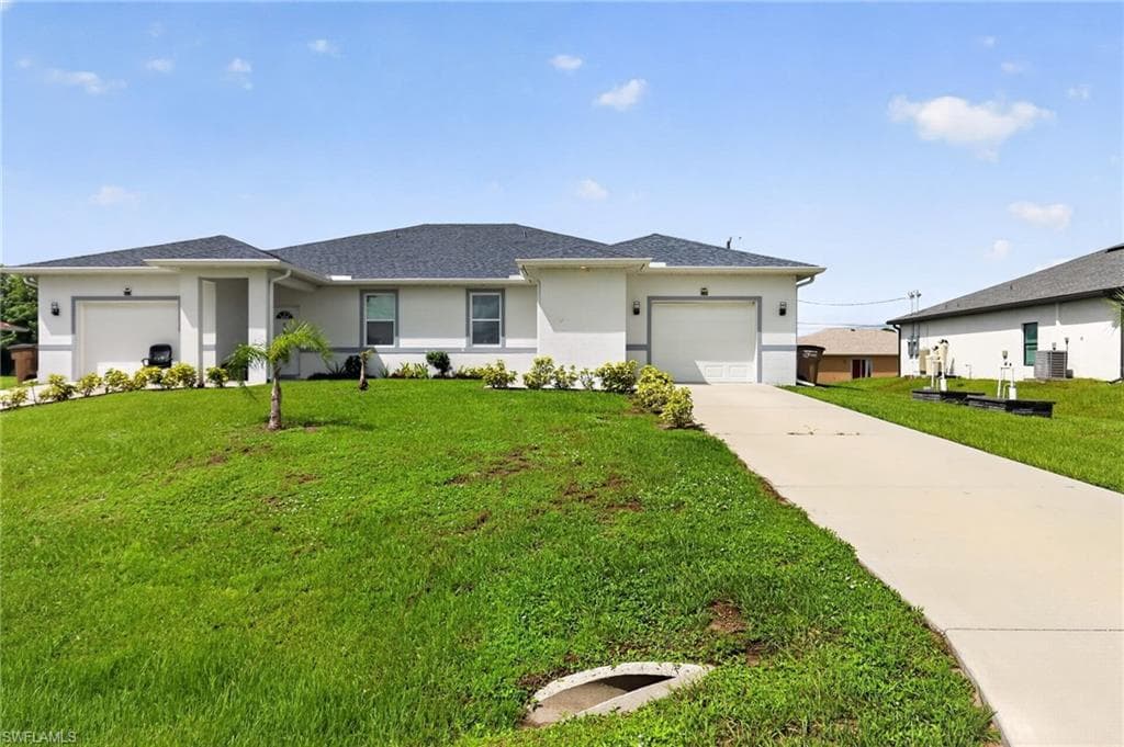 5209/5211 24th ST SW LEHIGH ACRES, FL 33973