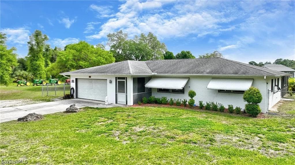 704 Cleveland AVE LEHIGH ACRES, FL 33972