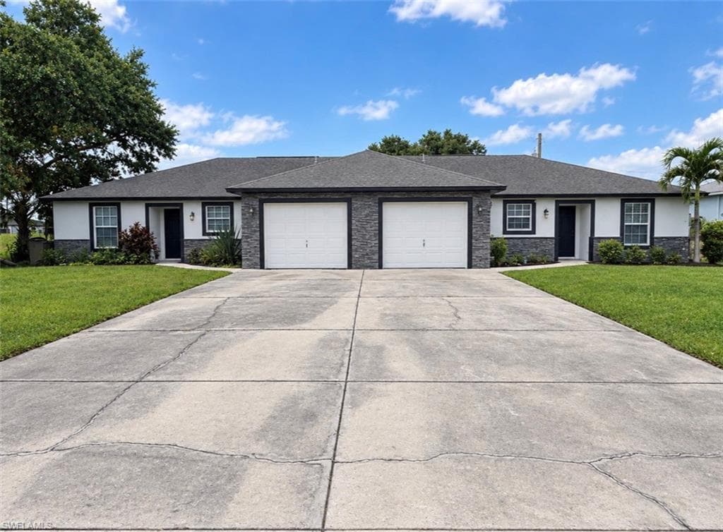 704 / 706 Gretchen AVE S LEHIGH ACRES, FL 33973