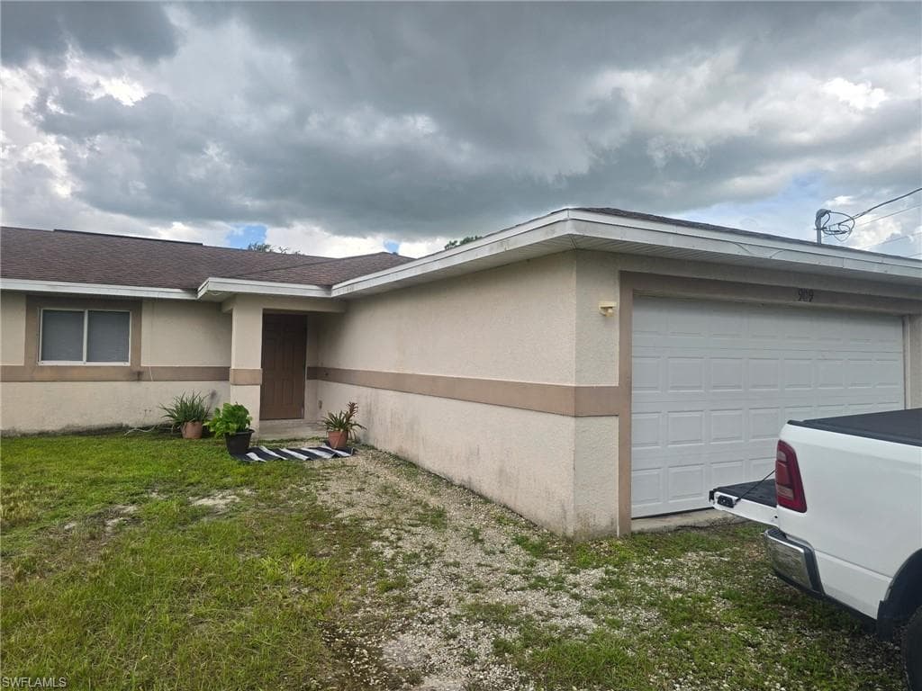 909 Eisenhower BLVD LEHIGH ACRES, FL 33974