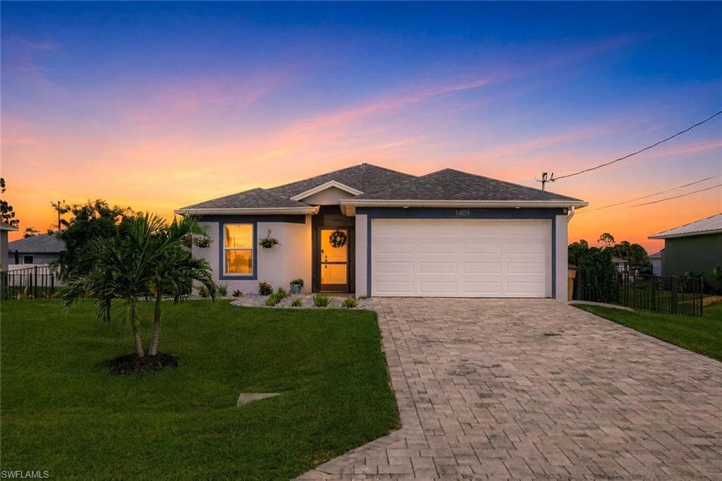 1409 NE 43rd TER CAPE CORAL, FL 33909