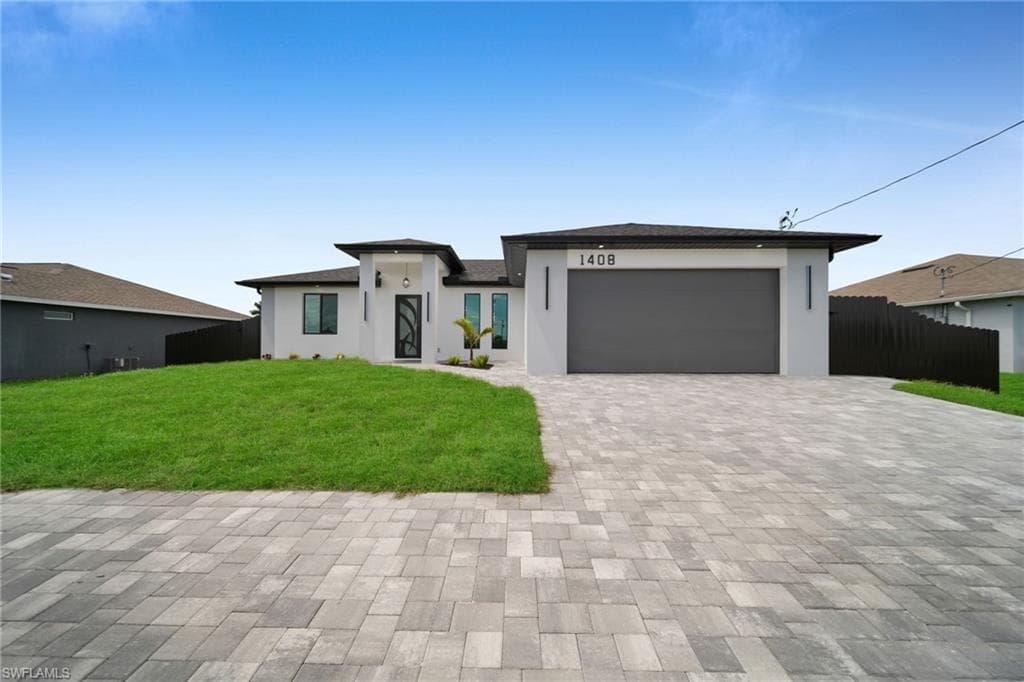 1408 Nelson RD N CAPE CORAL, FL 33993