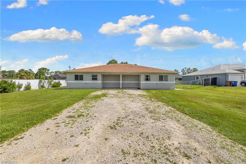 909/911 Jaguar BLVD LEHIGH ACRES, FL 33974